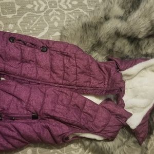 Beautiful fur vest with fur hood